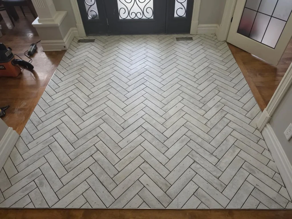 herringbone tile foyer transformation Ottawa